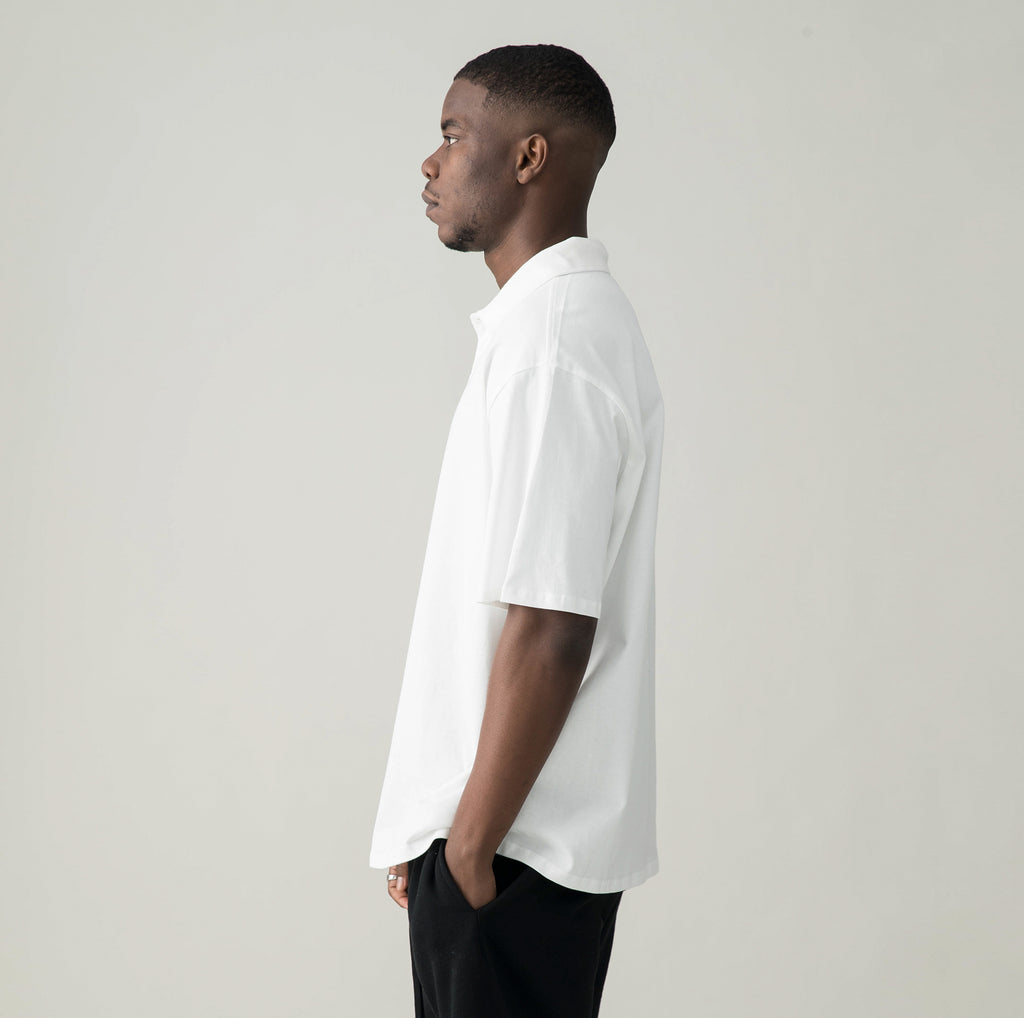 Polo enraciné dans les rituels – Blanc